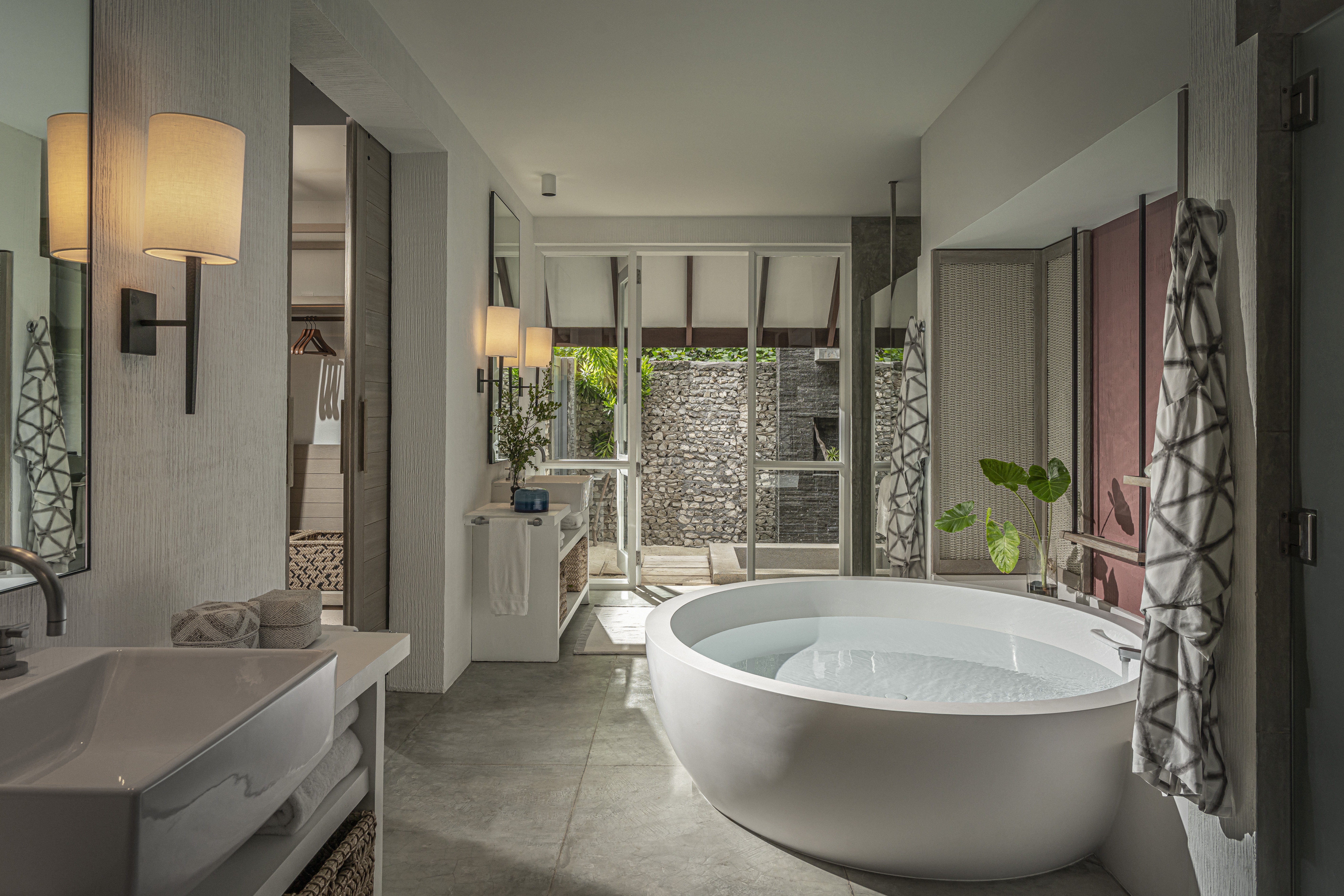 Beach villa exterior at Four Seasons Resort Maldives Landaa Giraavaru with private freshwater plunge pool and direct beach access