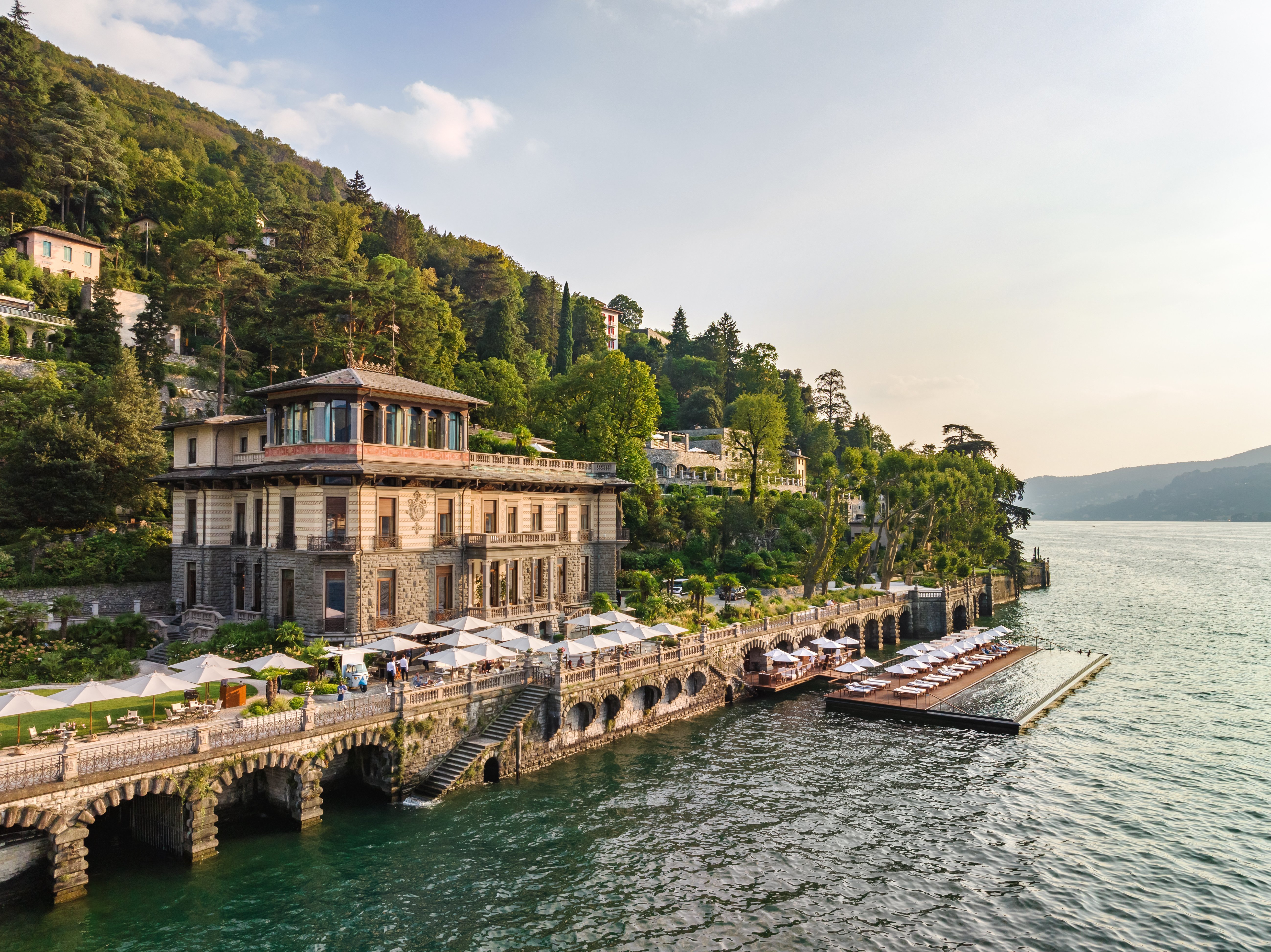 A Mandarin Oriental Lago di Como guest accommodation with the substantial Lake Como orientation and the dedicated heritage-villa-meets-contemporary-Mandarin-Oriental interior configuration evocative of the property's specific lakefront luxury identity