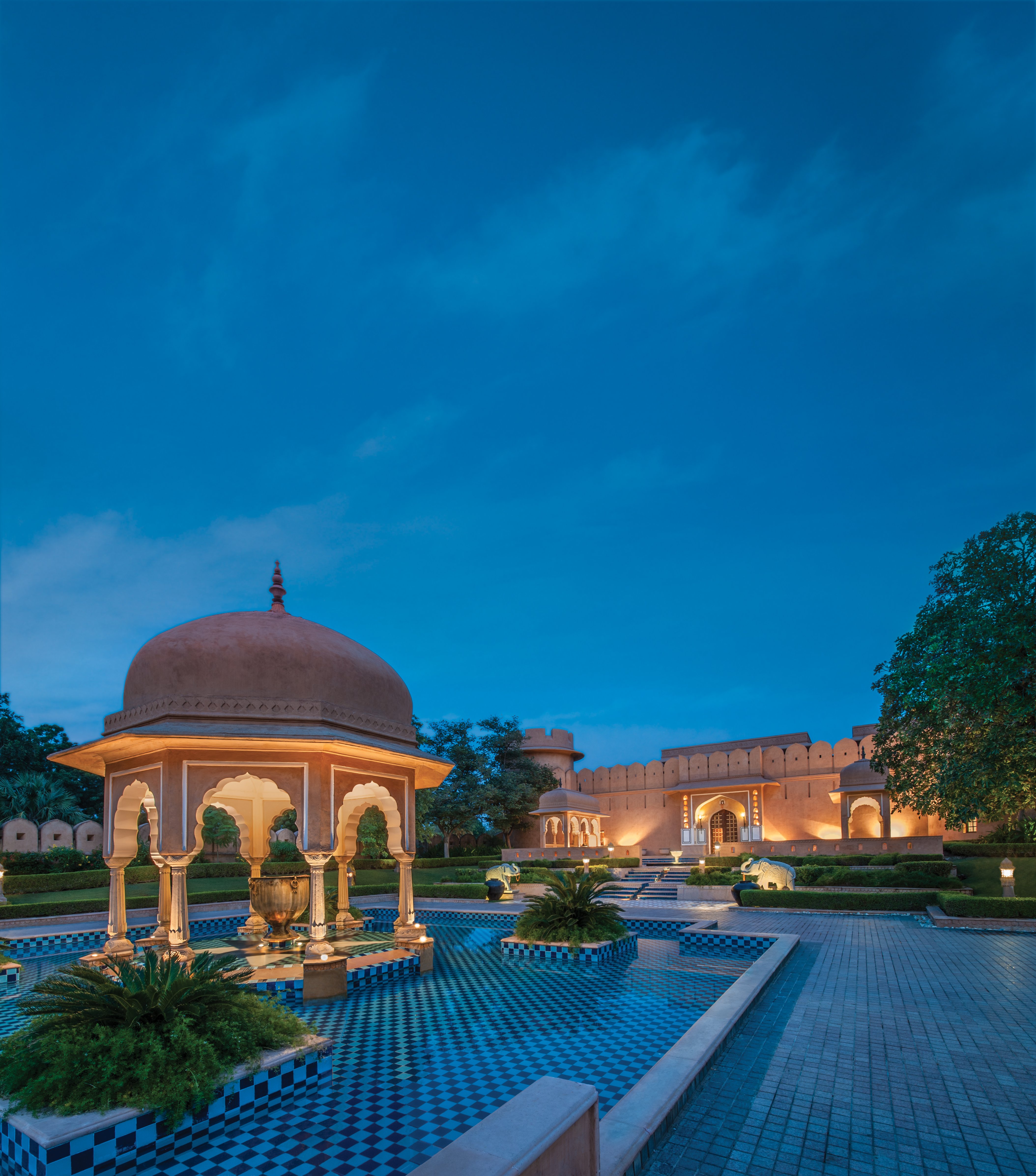 The Oberoi Rajvilas guest accommodation with the dedicated Rajasthani frescoed detailing and the substantial luxury interior that defines the property's palace-and-fort identity