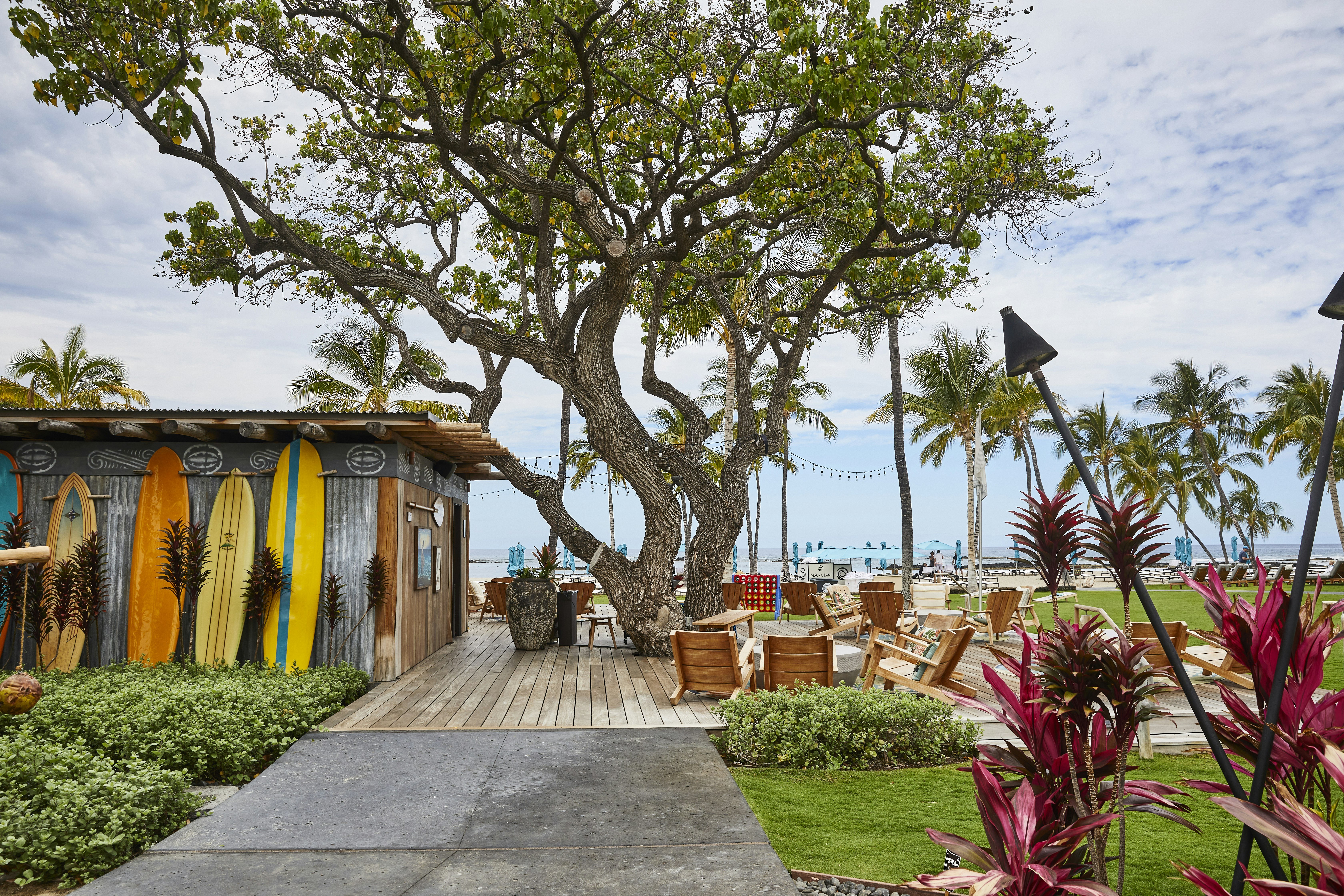 Mauna Lani Canoe House restaurant terrace showing the open-air dining position above the historic Hawaiian fishponds with Pacific Ocean view
