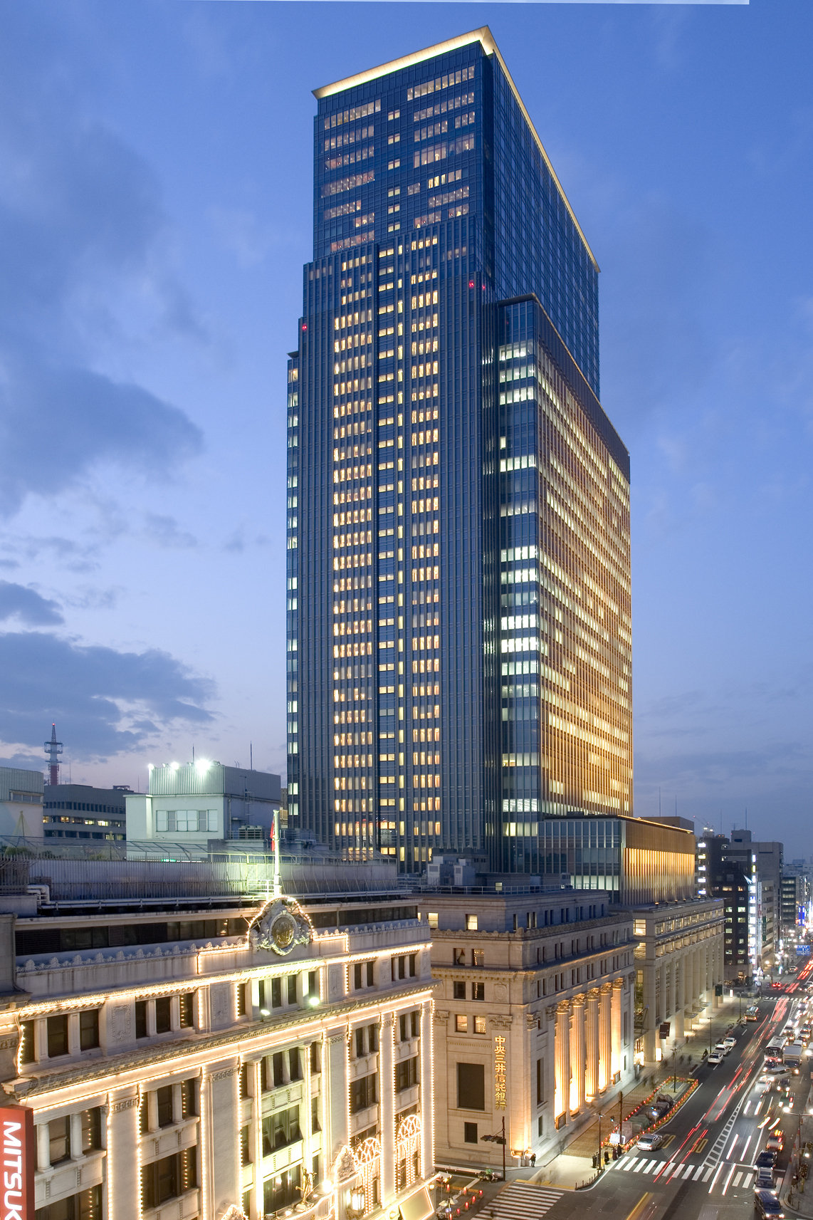 Mandarin Oriental Tokyo guest room interior with floor-to-ceiling windows showing the panoramic Tokyo skyline view