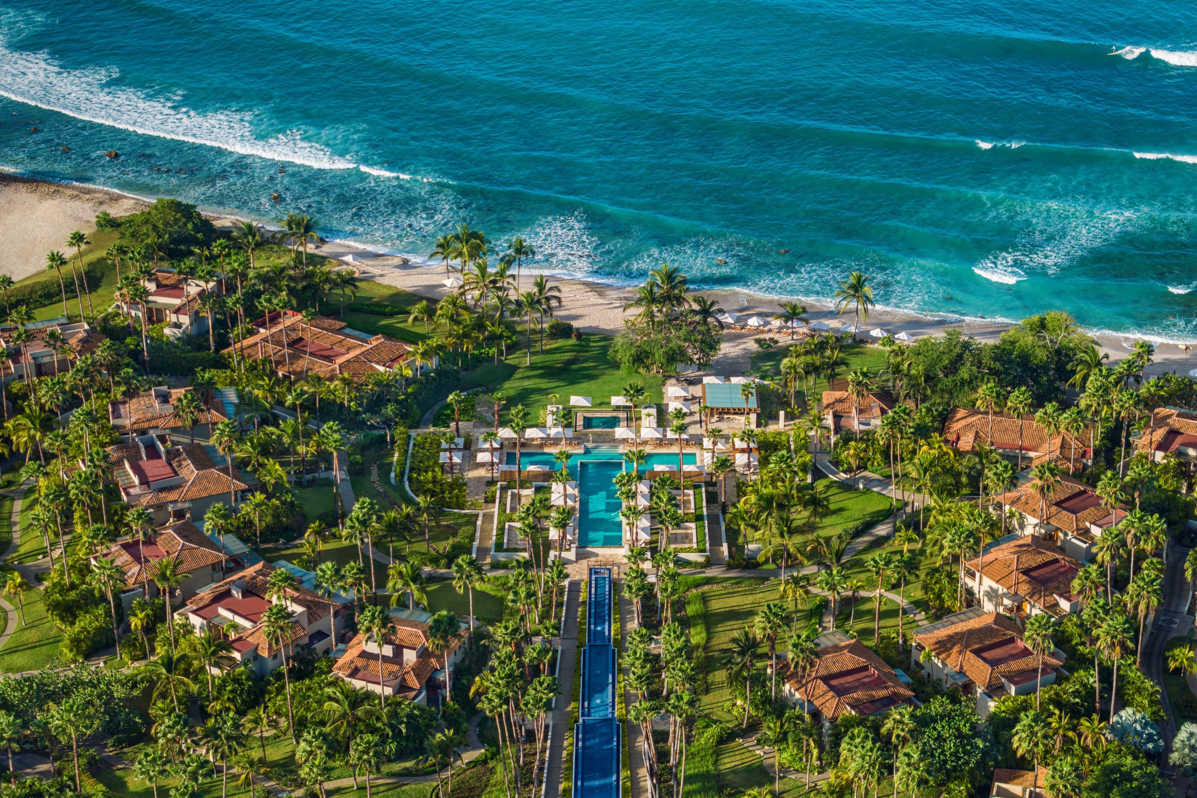 The St. Regis Punta Mita guest accommodation with the contemporary Mexican coastal interior and the substantial Pacific Ocean orientation that defines the beachfront resort