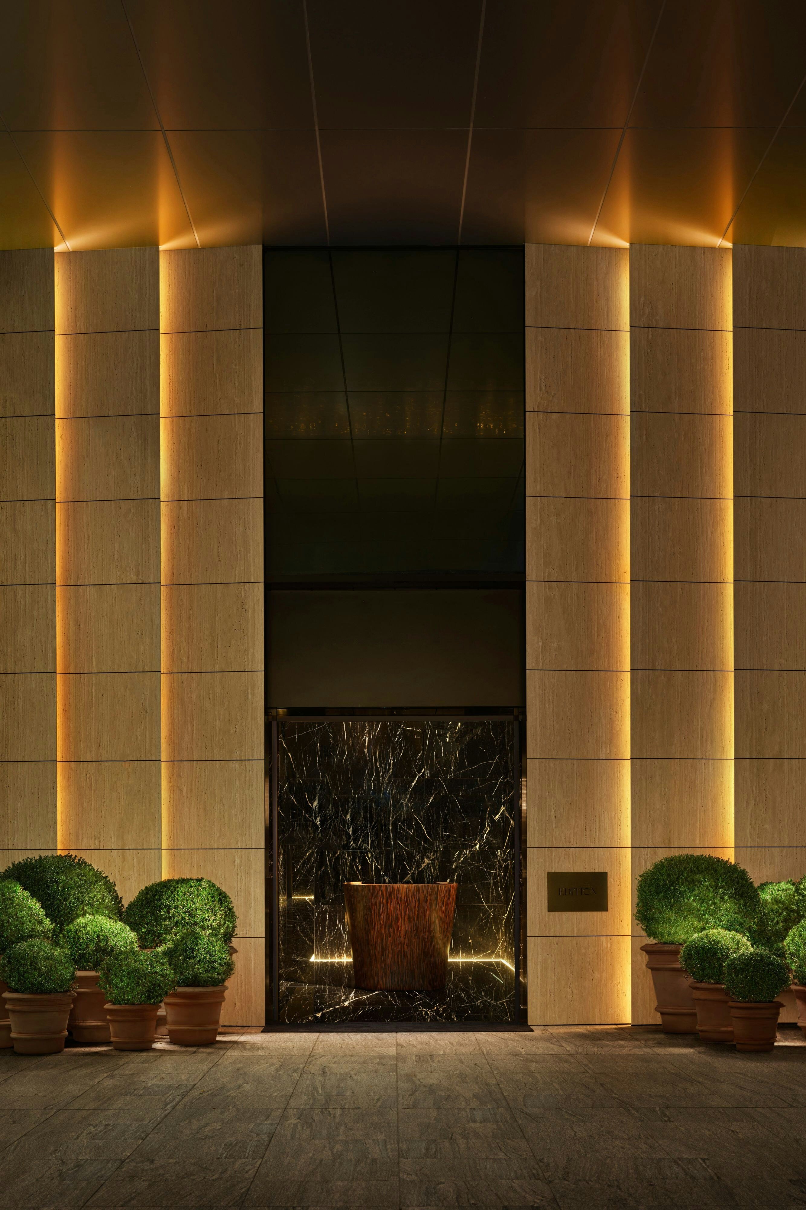 The Tokyo EDITION Toranomon Sky Lobby with floor-to-ceiling glass and panoramic Tokyo skyline view designed by Kengo Kuma