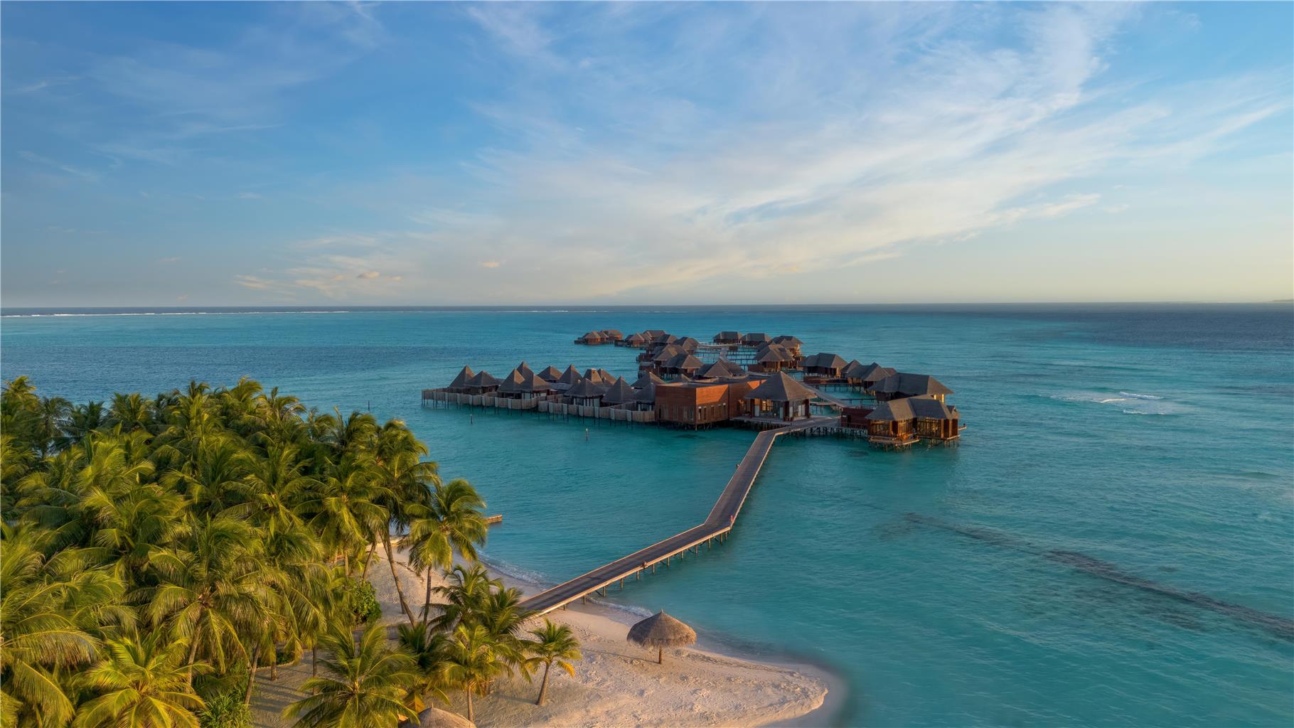 Conrad Maldives Rangali Island overwater villa with private freshwater pool and direct lagoon access showing the iconic Indian Ocean luxury resort architecture