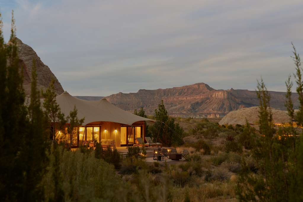 The celebrated Amangiri central swimming pool integrated around an existing sandstone rock formation — among the most photographed single resort pools in the world and the architectural centrepiece of the Aman property at Canyon Point, Utah