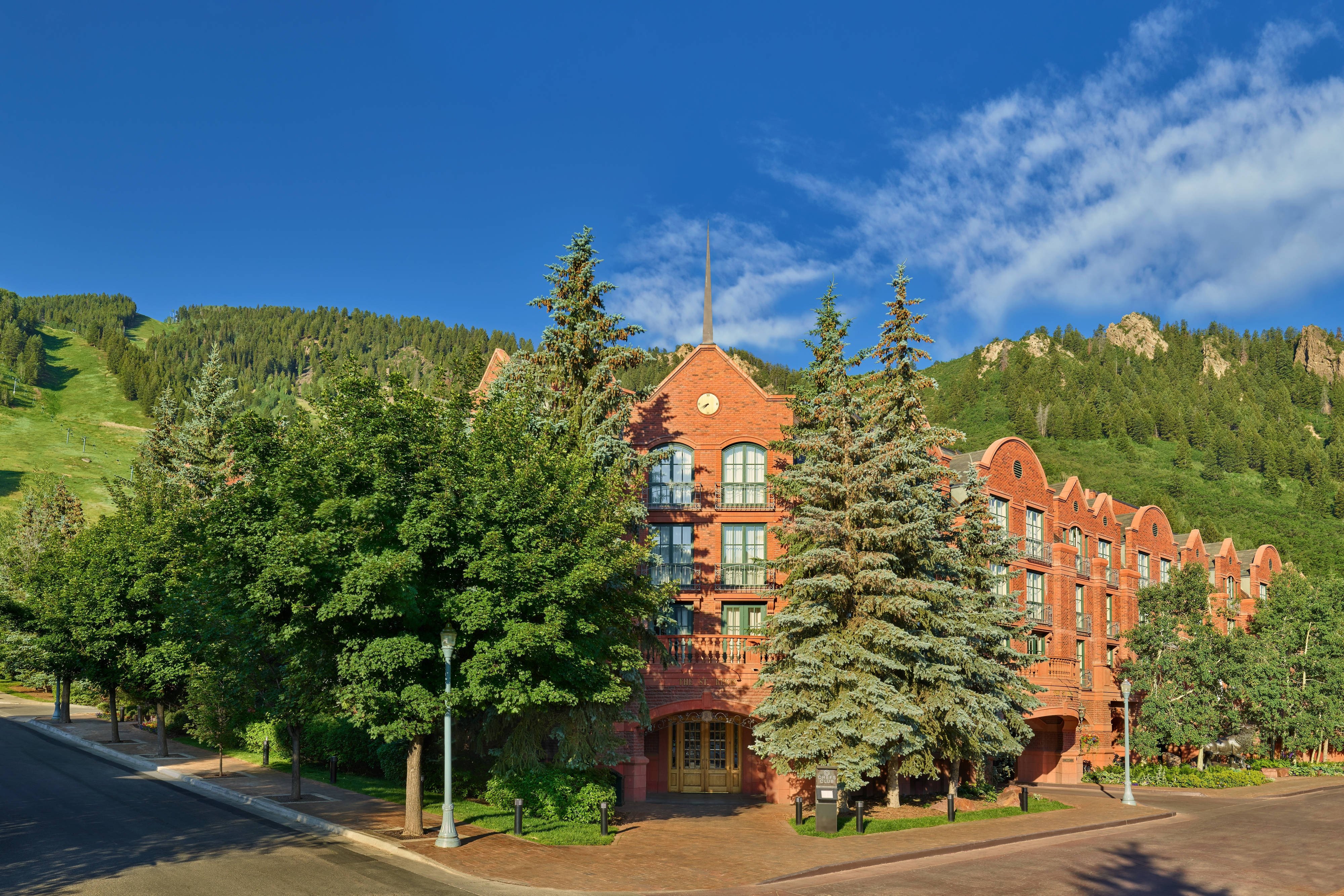 The St. Regis Aspen Resort guest room with mountain views and the contemporary mountain-luxury interior aesthetic