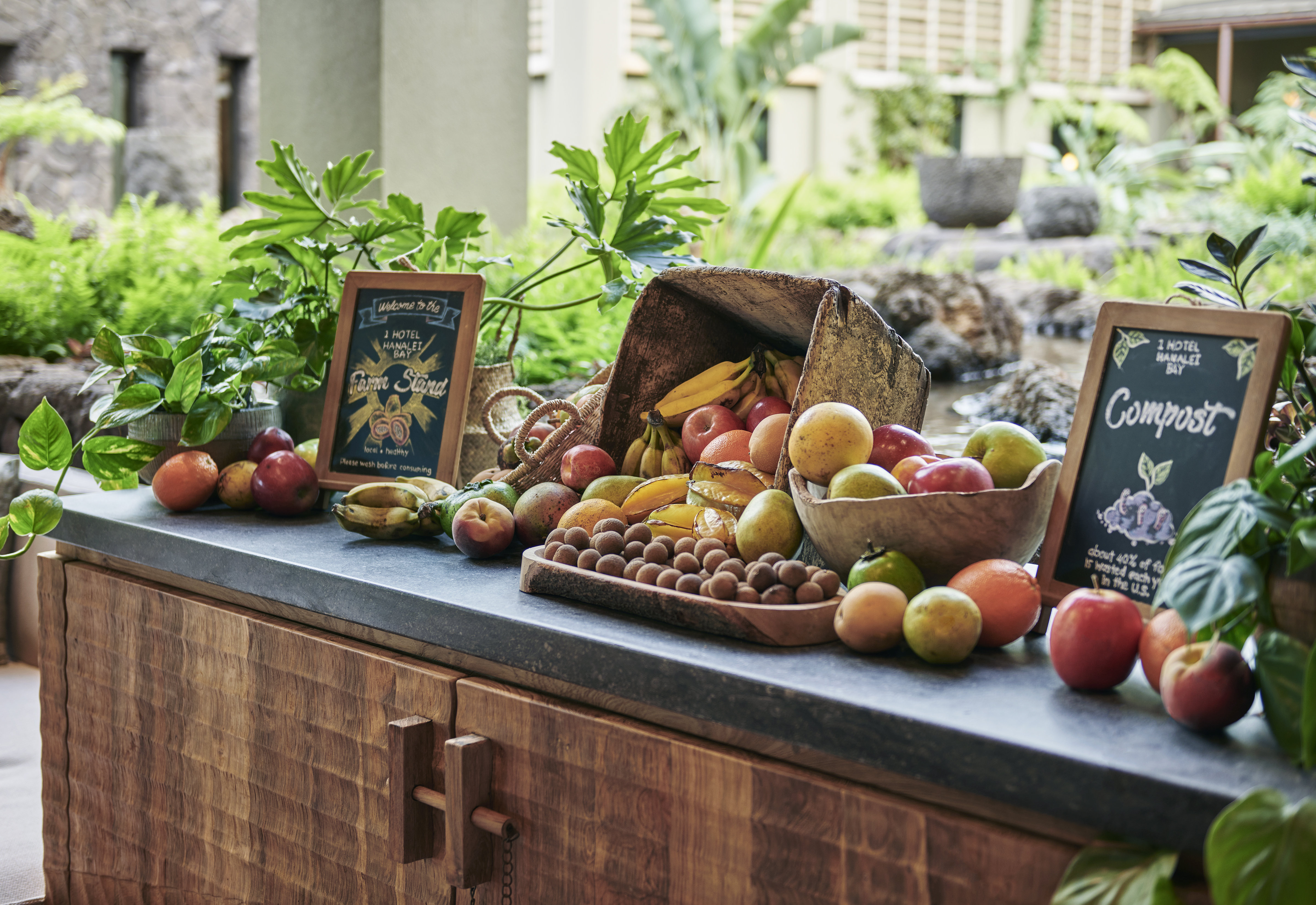1 Hotel Hanalei Bay open-air dining venue showing the indoor-outdoor architecture and the Pacific Ocean view that defines the resort's restaurant programme