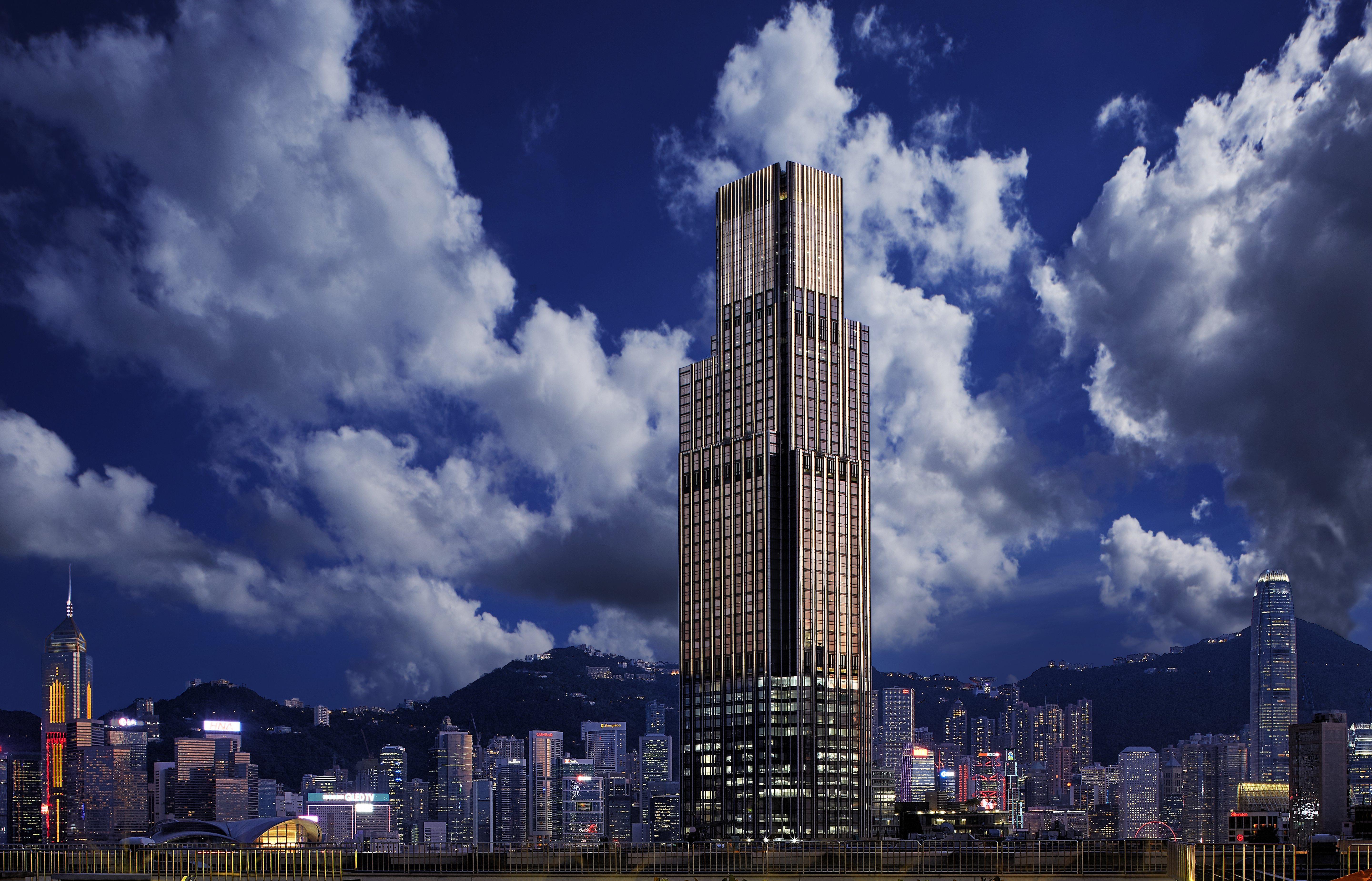 Rosewood Hong Kong guest accommodation with the Tony Chi residential-tradition luxury interior and the unobstructed Victoria Harbour view that defines the vertical-estate identity